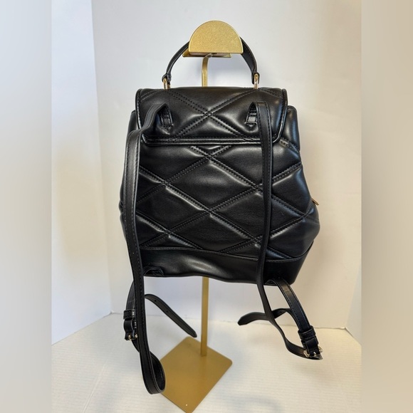 Michael Kors Serena MD Quilted Leather Flap Backpack in black. main image 6